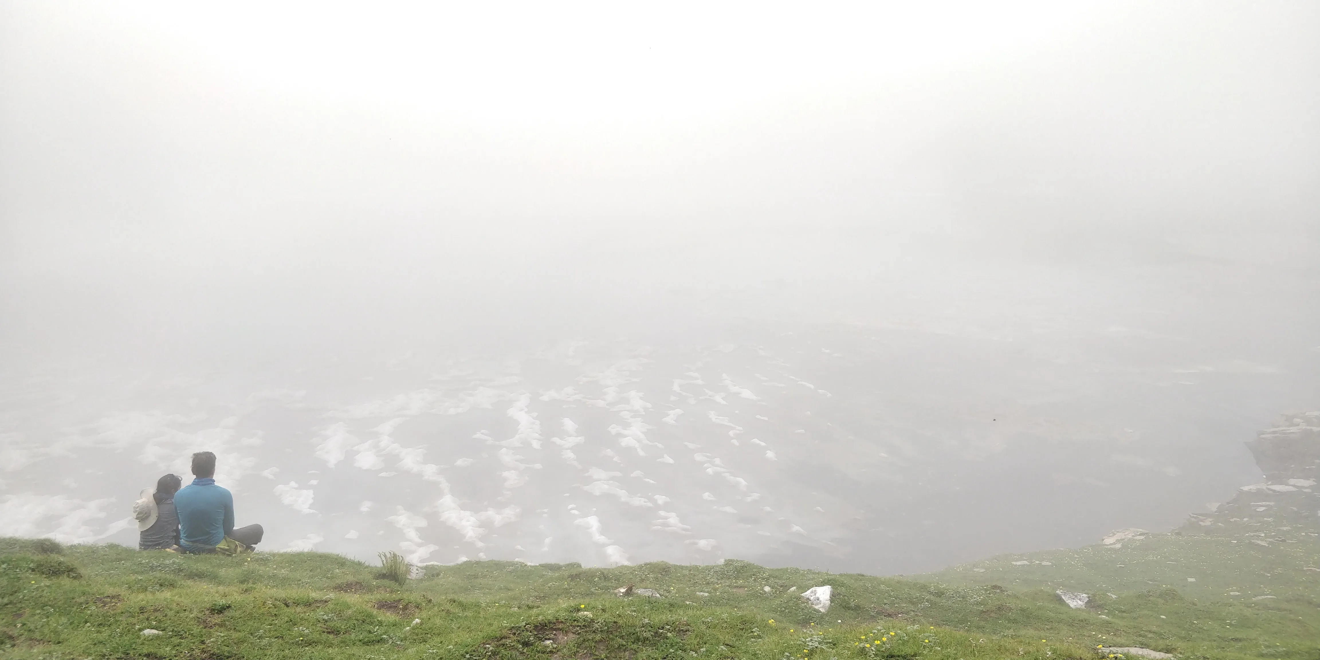 Couple meditating by Bhrigu lake